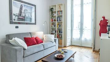 Apartamento | Área de estar | TV 35 polegadas com canais digitais