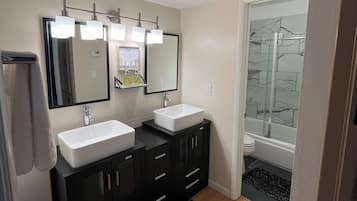 Hair dryer, towels, soap, toilet paper