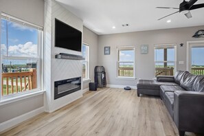 Smart TV, fireplace, books