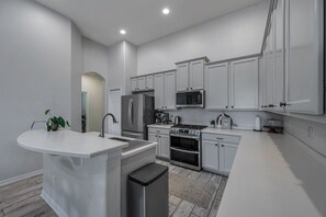 Private kitchen - Large 5 bedroom 3 full bath house close to beaches, shopping and parks. (Parrish)