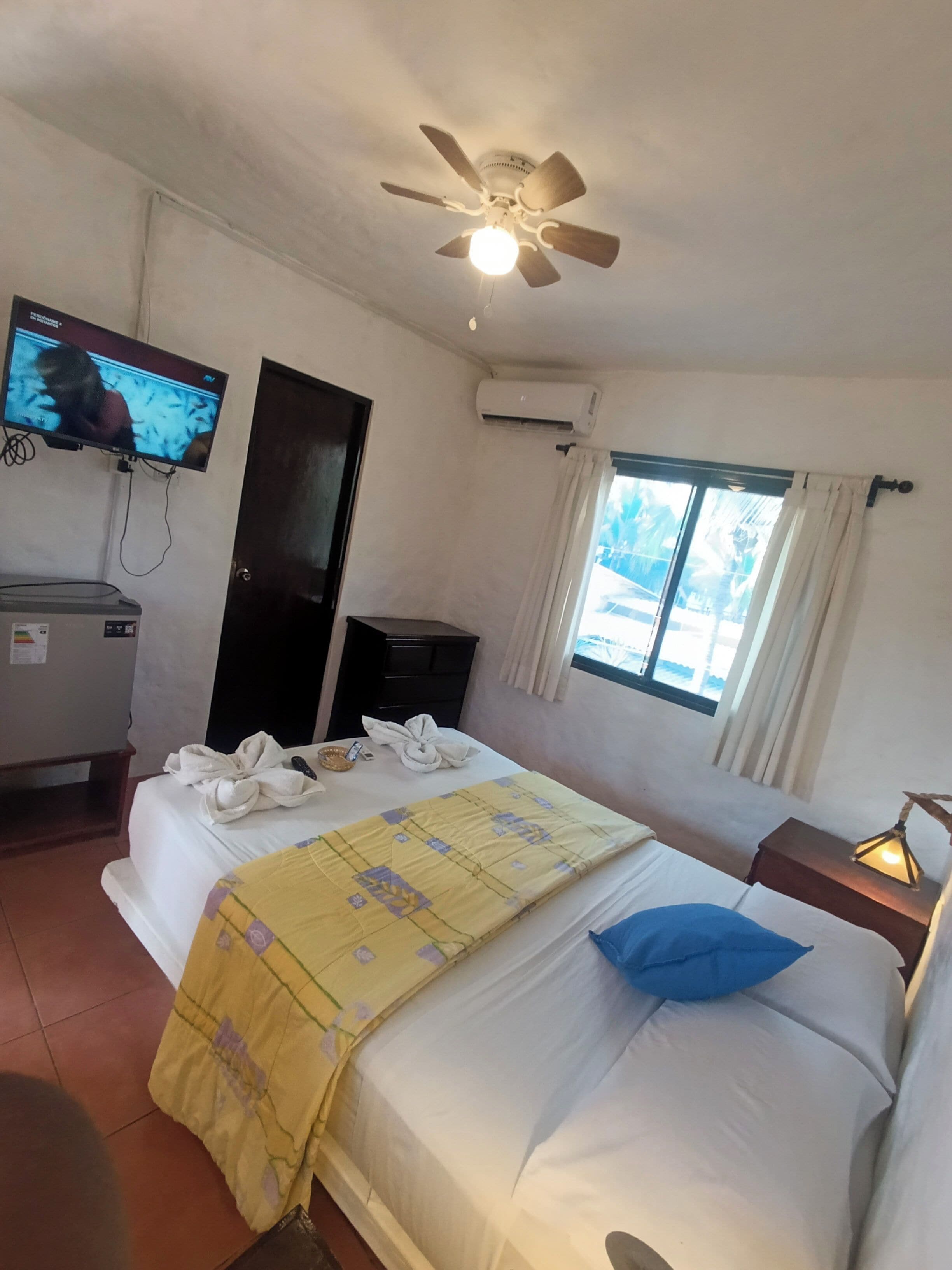 Comfort Room, 1 Queen Bed, Garden View (Air conditioning) | Down comforters, blackout drapes, free WiFi