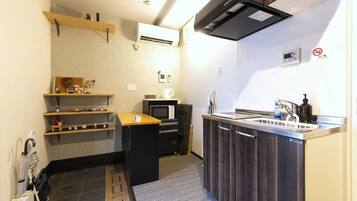 Fridge, microwave, stovetop, cookware/dishes/utensils