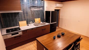 Fridge, microwave, stovetop, cookware/dishes/utensils