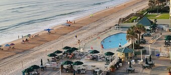 oceanfront studio , 2 pools 2 hot tubs. garage mini fridge and microwave.