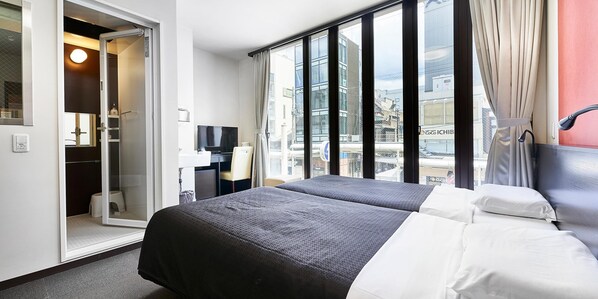 Deluxe Twin Room | Pillowtop beds, desk, free WiFi, bed sheets