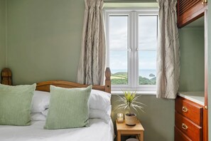 4 bedrooms, iron/ironing board, travel cot, WiFi