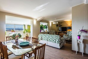 Apartment, City View | Living area | 35-inch TV with satellite channels - Golden Park Apartment with Terrace  (San Gregorio di Catania)