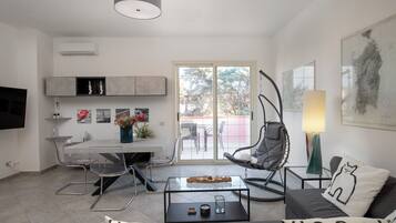 Apartment | Living area | 35-inch TV with digital channels