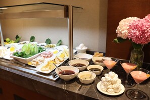 Dagelijks ontbijtbuffet (EUR 15 per persoon)