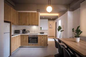 Apartamento urbano | Cozinha privada | Geladeira grande, micro-ondas, fogão, lava-louças