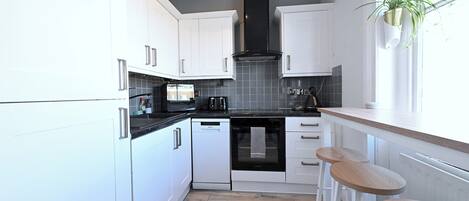 Apartment | Private kitchen | Fridge, microwave, oven, stovetop