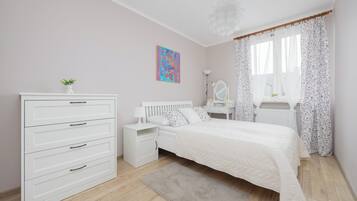 Apartment, 1 Bedroom, Balcony | 1 bedroom, individually decorated, bed sheets