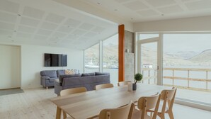 Panoramic Apartment | Living area | 43-inch TV with digital channels