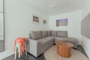 Standard House | Living room | 40-inch flat-screen TV with digital channels, TV - Charming 2Br Retreat In Vestmanna (Vestmanna)