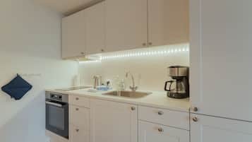 Standard Studio | Private kitchen | Full-sized fridge, oven, stovetop, coffee/tea maker