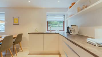 Apartment | Private kitchen | Full-sized fridge, coffee/tea maker, electric kettle