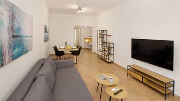 Comfort Apartment, 2 Bedrooms | Living area | 43-inch Smart TV with digital channels