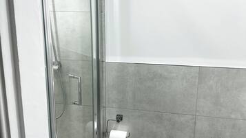 Shower, towels, toilet paper