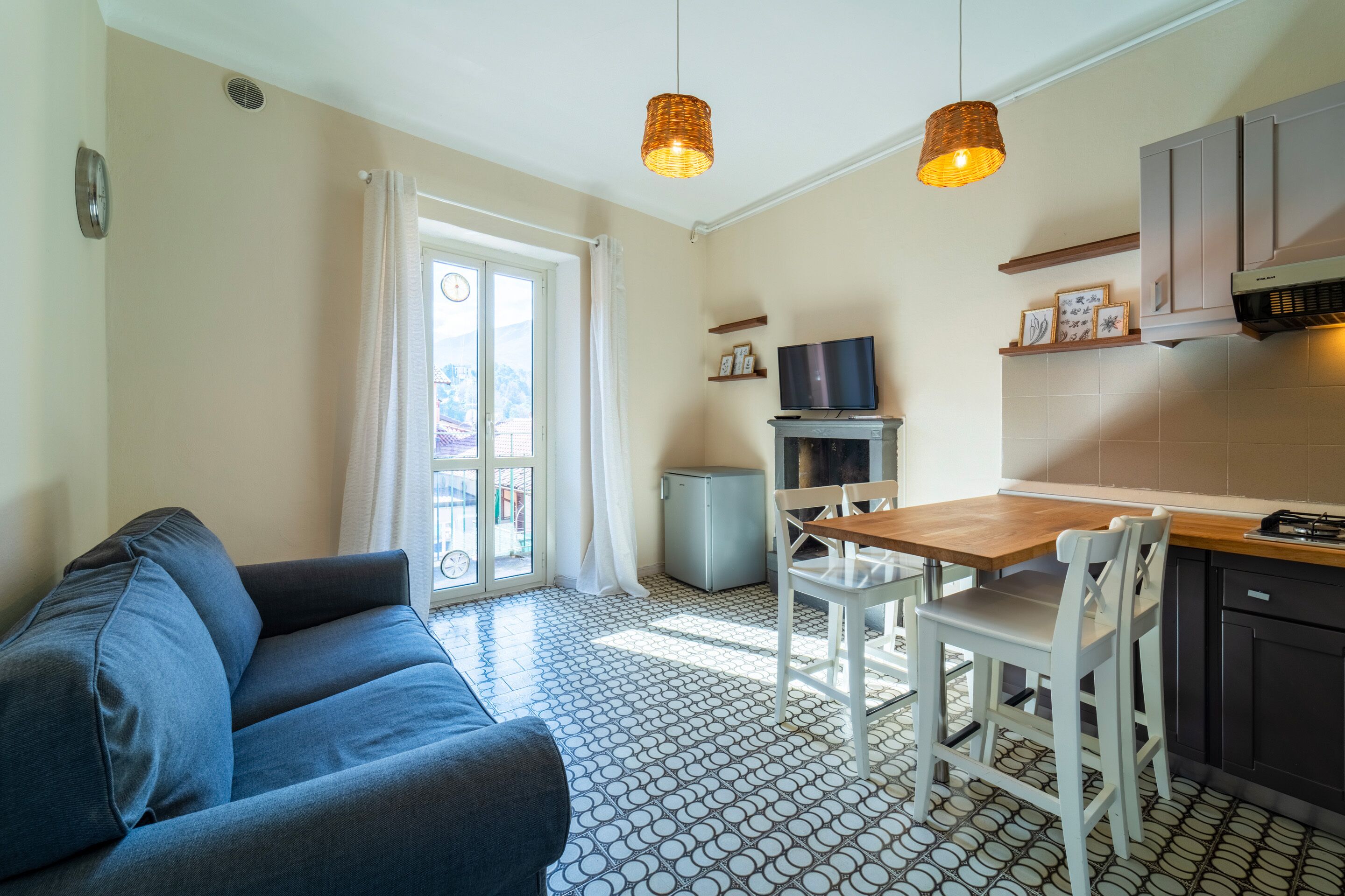 Apartment, Balcony, City View | Living area | 35-inch TV with digital channels