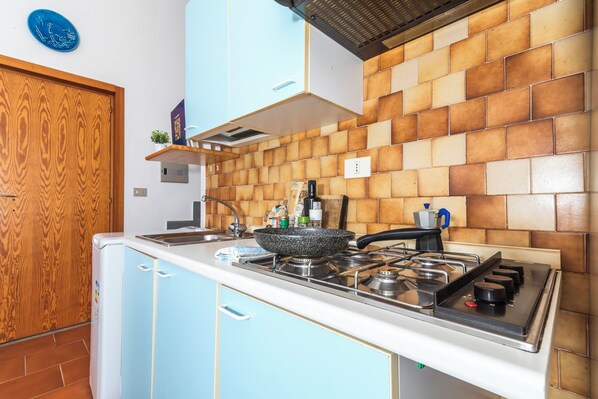 Fridge, stovetop, coffee/tea maker, cookware/dishes/utensils