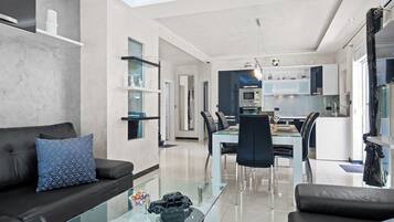 Honeymoon Villa, Multiple Bedrooms (Villa Bianco Nero) | Living area | 21-inch flat-screen TV with satellite channels, fireplace