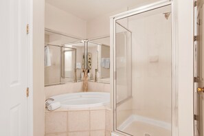 Shower, jetted tub, towels