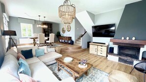 TV, fireplace, books, offices