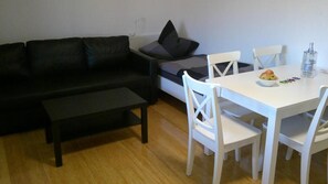 Condo, Balcony | Living area | 51-inch flat-screen TV with satellite channels