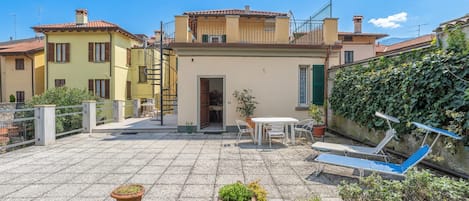 Departamento familiar, varias habitaciones (Casa Caterina) | Restaurante al aire libre