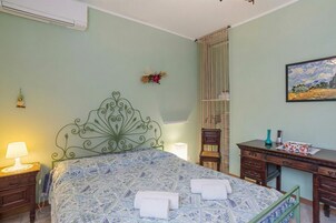 Apartamento familiar, varias habitaciones (Casa Caterina) | 1 dormitorio, tabla de planchar con plancha, wifi gratis y ropa de cama