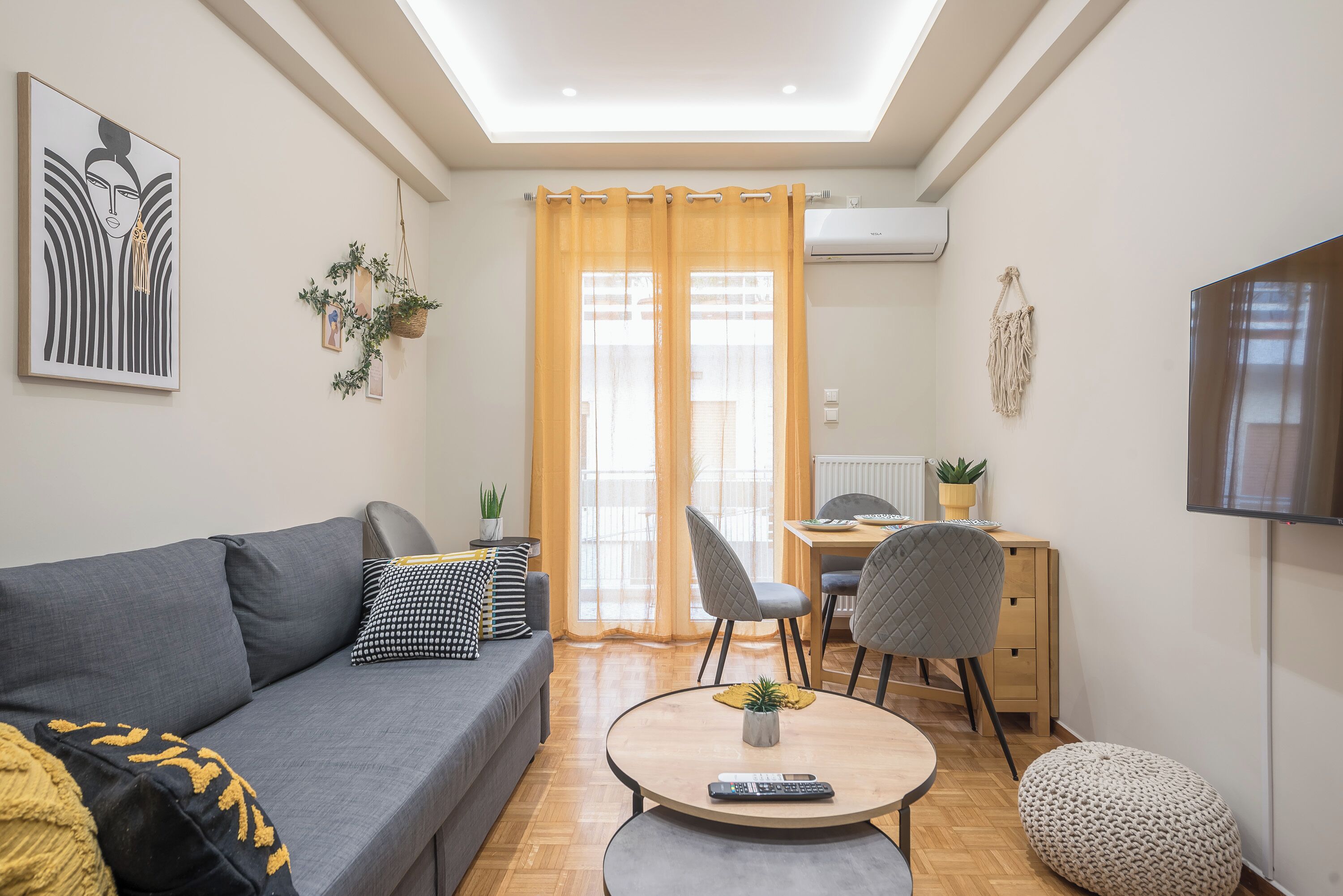 Comfort Apartment, Balcony | Living area | 32-inch flat-screen TV with digital channels