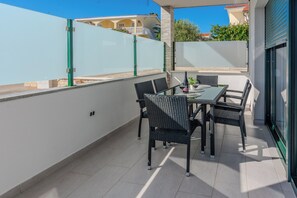 Apartamento conforto | Terraço/pátio