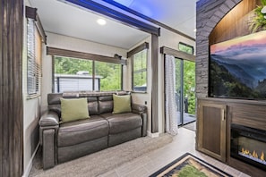 Smart TV, fireplace, table tennis, books