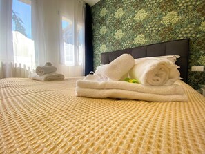 Superior Quadruple Room | 羽绒被、加厚床垫、特色装修、特色家居