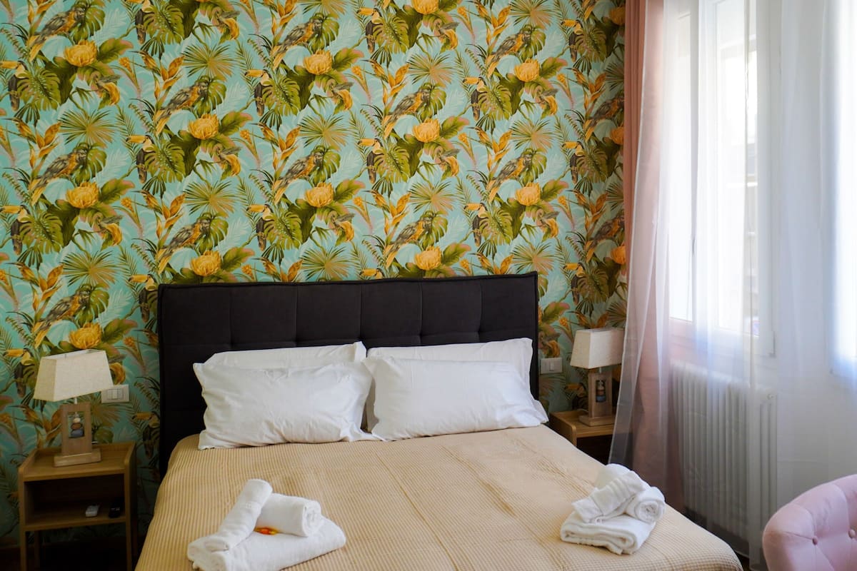 Exclusive Quadruple Room, City View | Down duvets, pillow-top beds, desk, laptop workspace