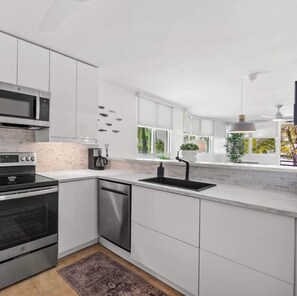 Fridge, microwave, stovetop, dishwasher - #15 Chic 3BR, 2BA Apartment at Jobos Beach (Isabela)