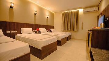 Premium bedding, down comforters, in-room safe, desk