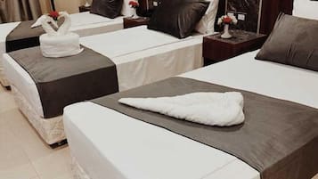 Premium bedding, down comforters, in-room safe, desk