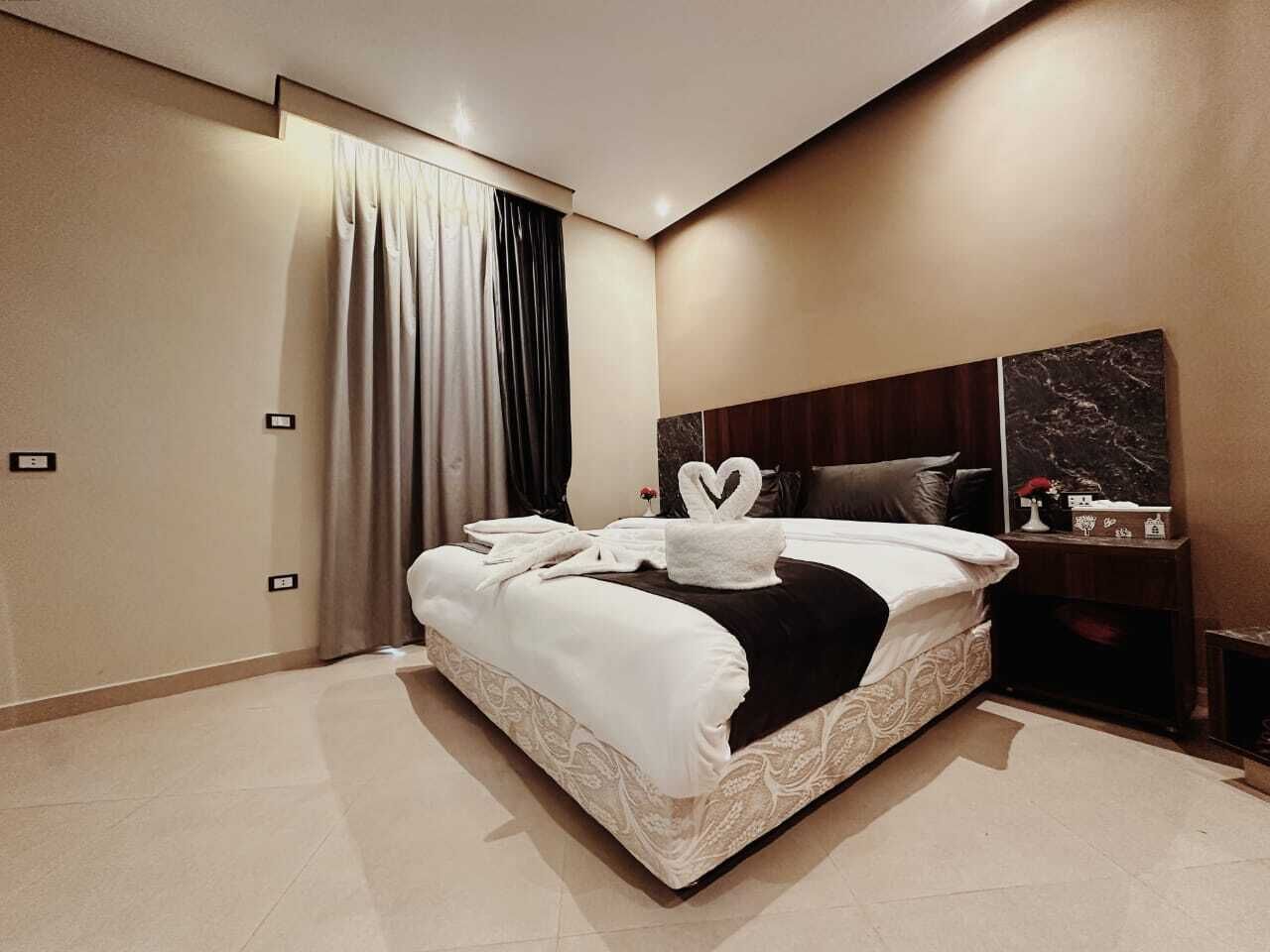 Premium bedding, down comforters, in-room safe, desk
