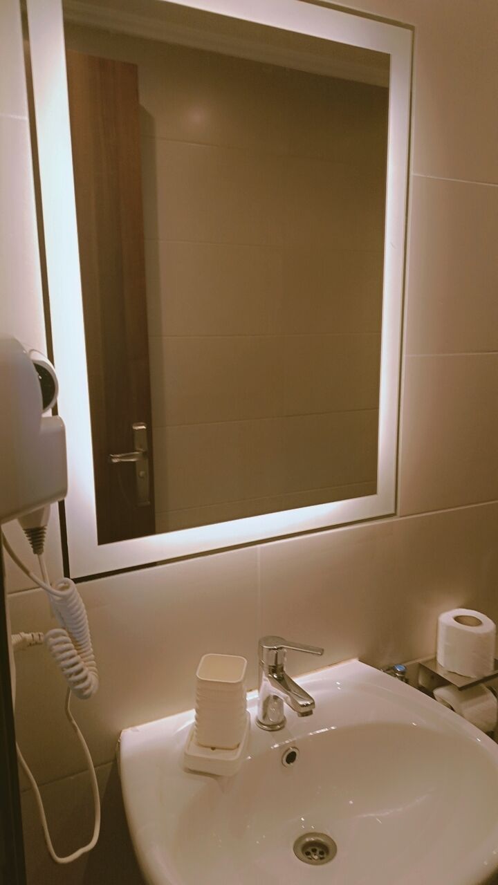 Habitación Deluxe doble | Baño | Cabezal de ducha con hidromasaje