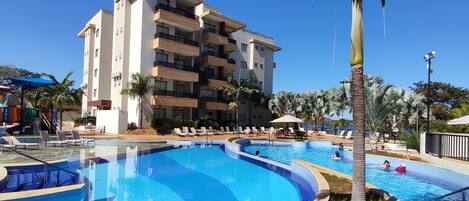 3 indoor pools, open 8:00 AM to 11:00 PM, pool umbrellas, pool loungers