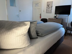 Ropa de cama hipoalergénica, cortinas blackout y wifi gratis 