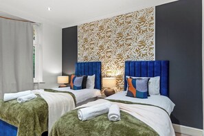 3 habitaciones, tabla de planchar con plancha y acceso a internet 