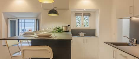 Fridge, microwave, dishwasher, coffee/tea maker