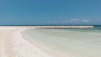 On the beach, white sand