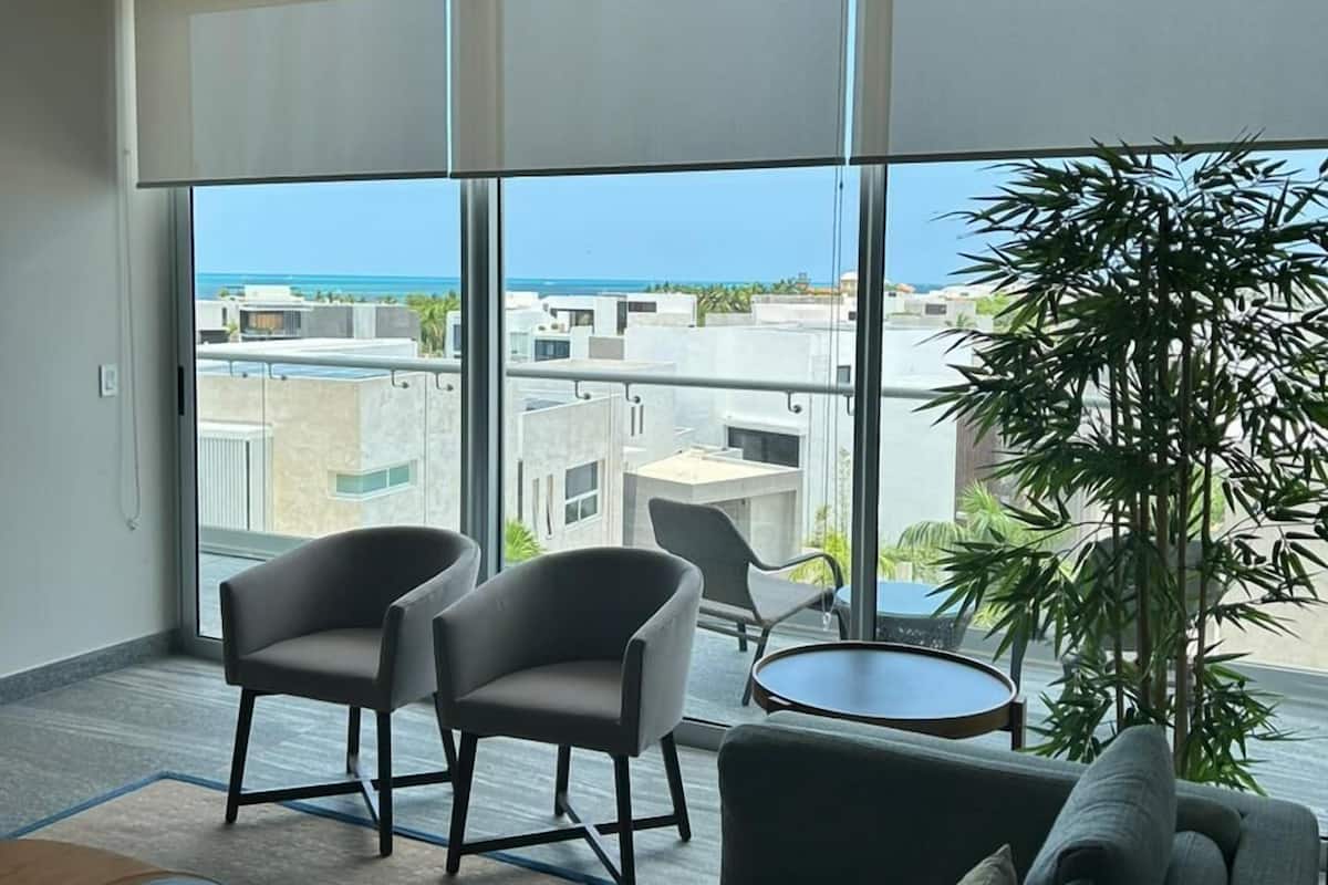 Family Apartment, Balcony | Living area | TV