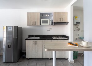 Fridge, microwave, dishwasher, coffee/tea maker