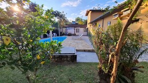 Outdoor pool, open 10:00 AM to 10:00 PM, sun loungers