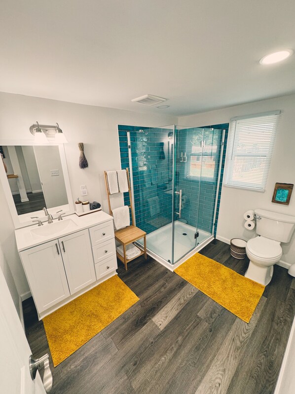 Shower, hair dryer, towels, soap