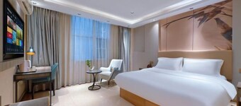 Home Inn Alliance Huayi Hotel (Tancheng Railway Station Tanguo Ancient City)